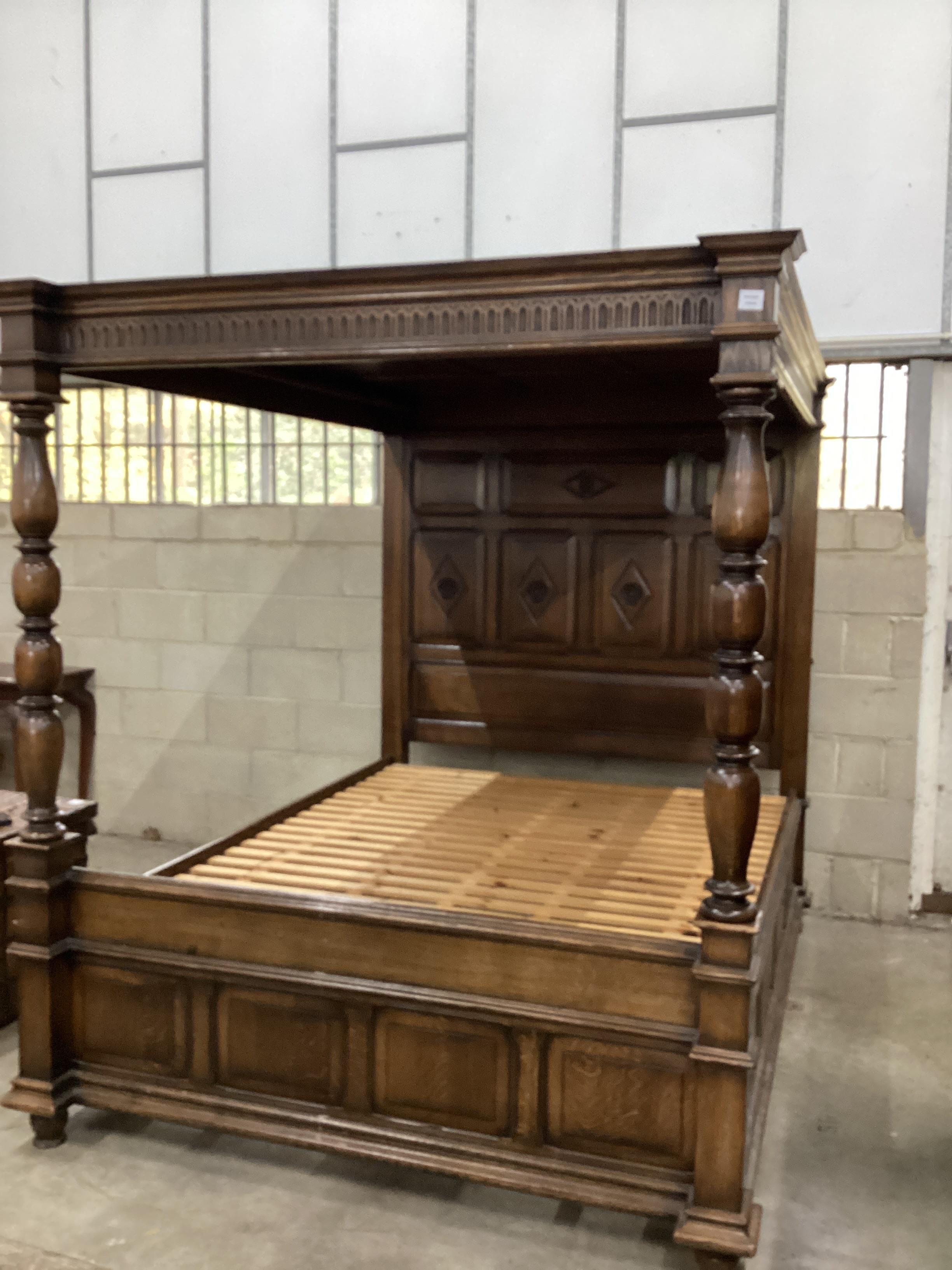 A 17th century style oak four poster bed, width 169cm, height 198cm